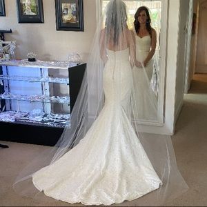 Handmaid ivory cathedral veil.